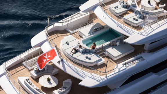 luxury yacht Opari with pool, sailing in the blue waters of Greece.